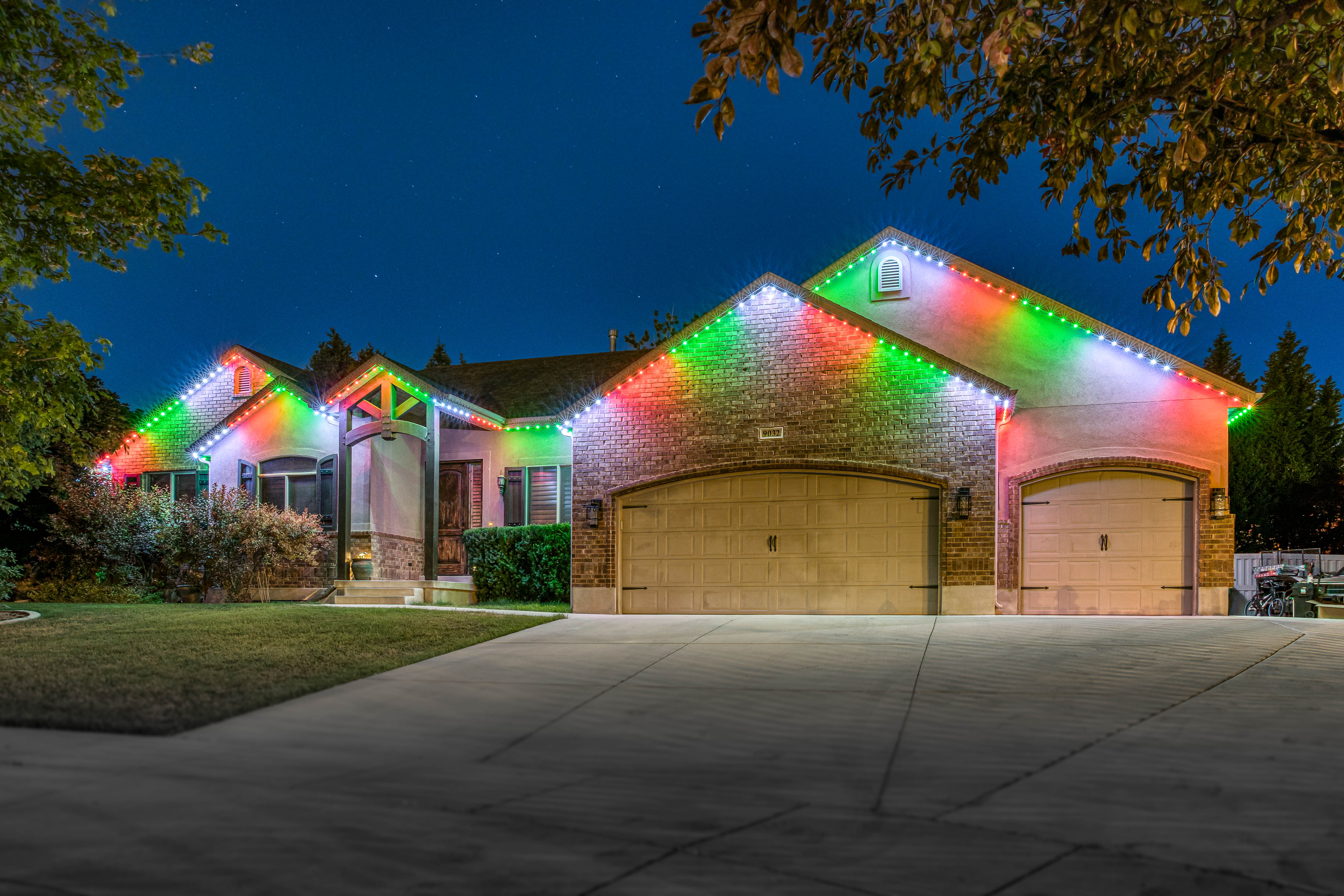 Home with LED roofline lighting at night